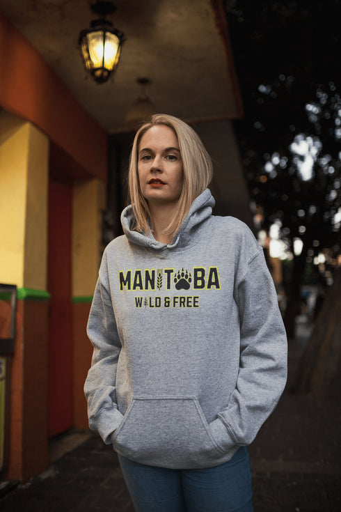 Get ready to embrace your inner wild with this Manitoba hoodie, featuring a bear paw for the ‘O’ and wheat for the ‘I’—because nothing says ‘wild and free’ like a province where bears and wheat fields both thrive.